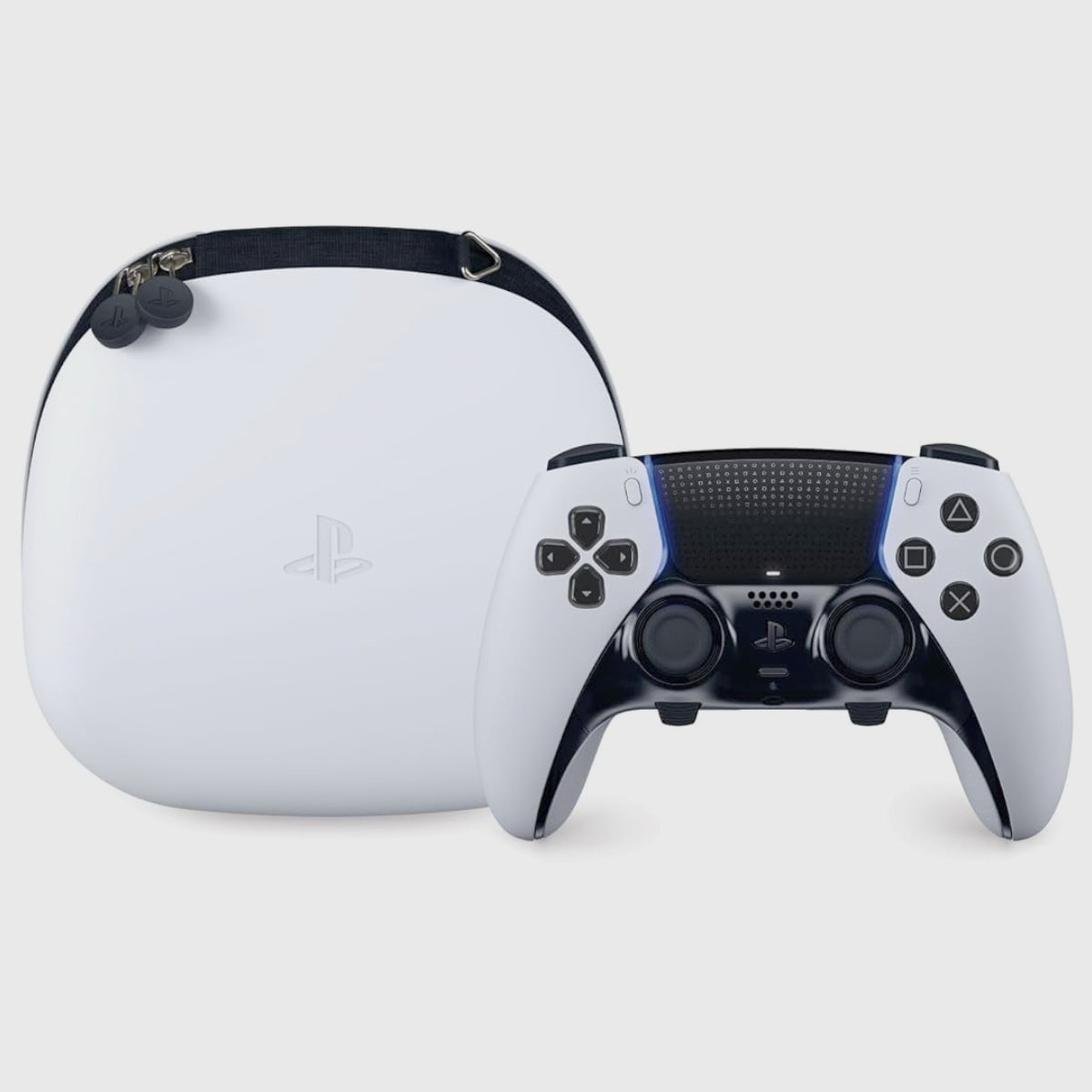 PlayStation DualSense Edge controller in white next to its carry case.