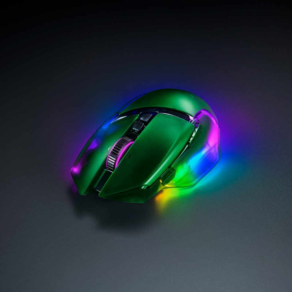 Razer Basilisk V3 Pro 35K – Phantom Green Edition, its RGB lights shining through its transparent chassis.