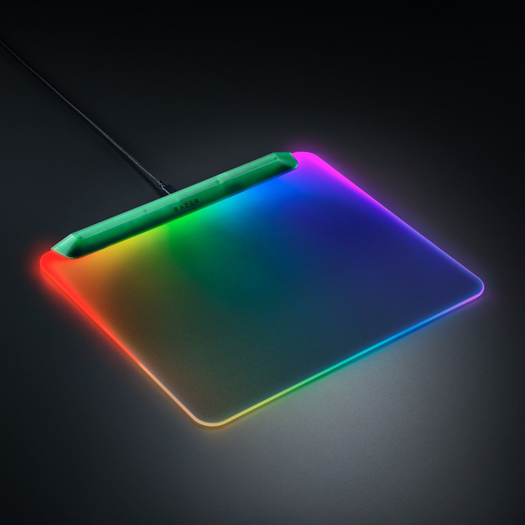 Razer Firefly V2 Pro – Phantom Green Edition, its RGB LEDs surrounding its surface and its PCB visible.