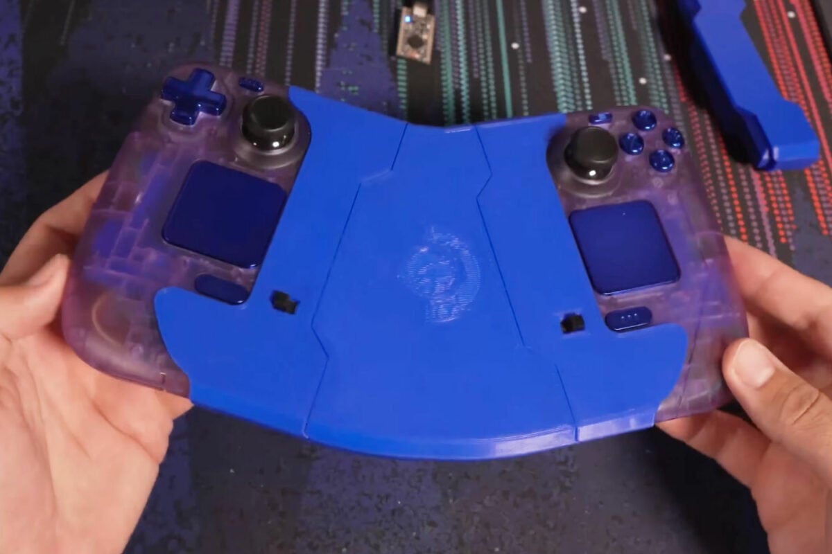 TommyB's Steam Controller 2 mod with a 3D printed mid section angling the trackpads upward.