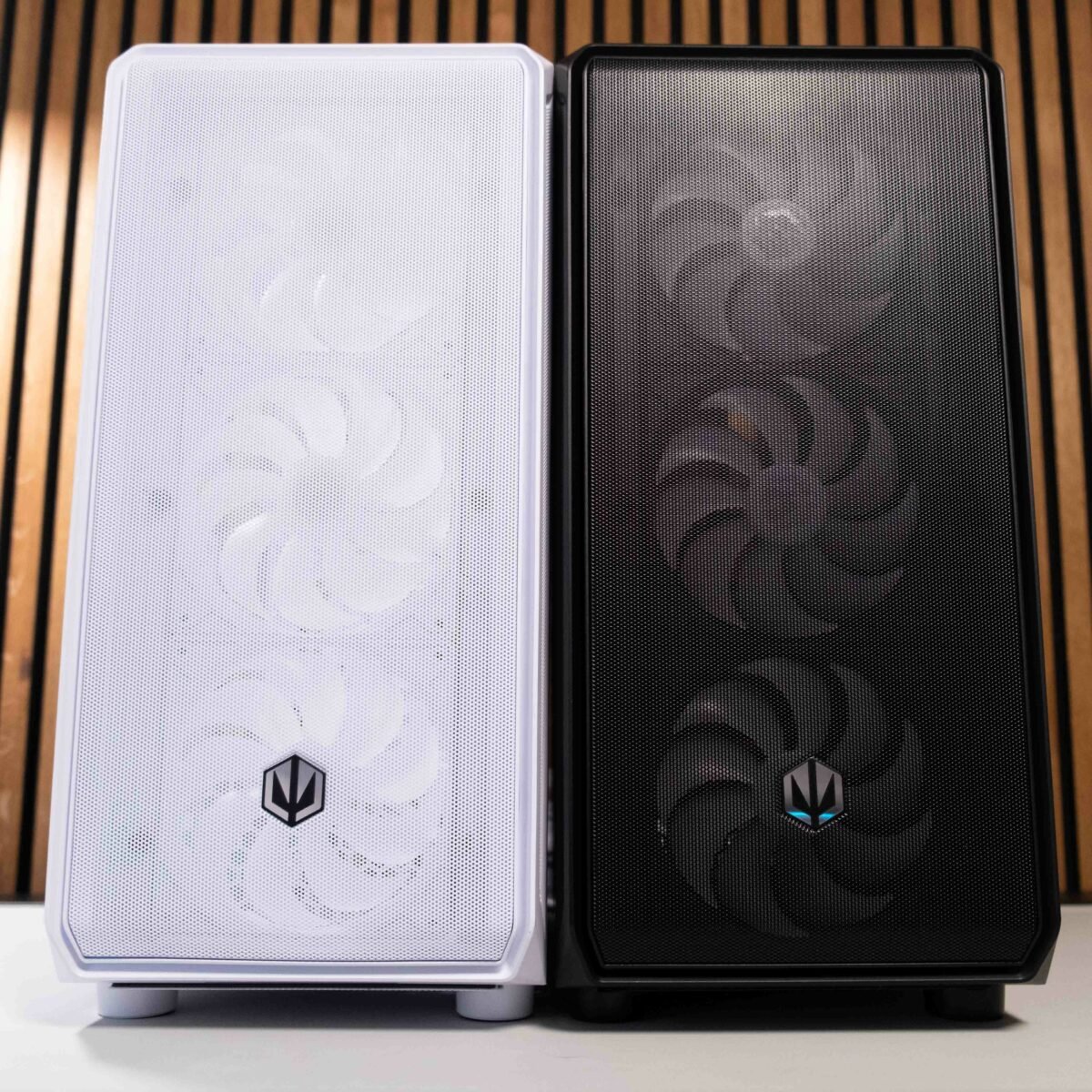 Black and white Endorfy Arx 700 ARGB cases next to each other.
