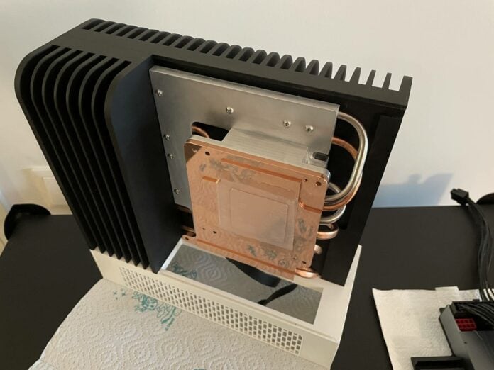 Monochrome 2 custom fanless 7.5L Strix Halo system.