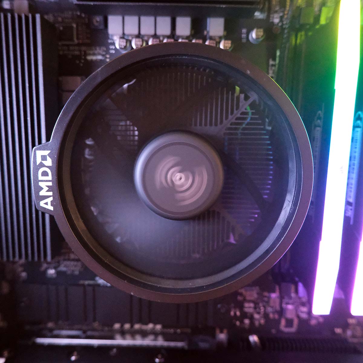 A close-up of the AMD Wraith Stealth CPU cooler inside CyberPowerPC Ultra R87 Pro.