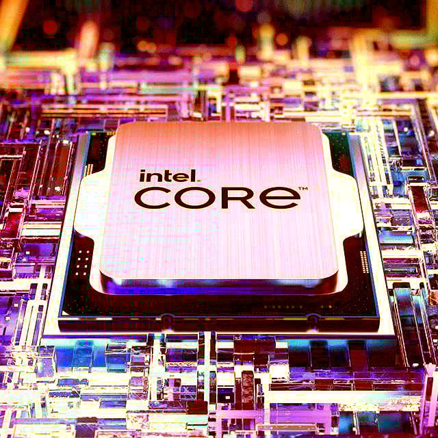Intel Core processor lying flat on cubic surface, with a red filter overriding its usual blue hue.