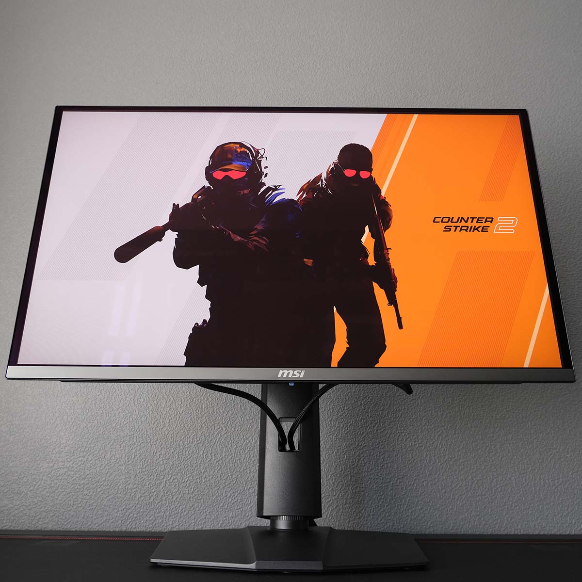 MSI MAG 272QP QD-OLED X50, displaying a Counter-Strike 2 wallpaper.
