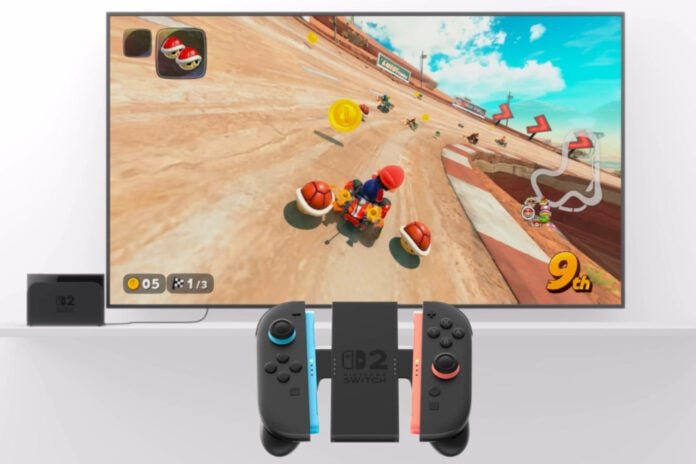 Nintendo Switch 2 console in its dock, playing Mario Kart World, Joy-Con 2 controllers floating in front of the TV>