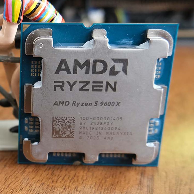 Ryzen 5 9600X processor, standing upright.