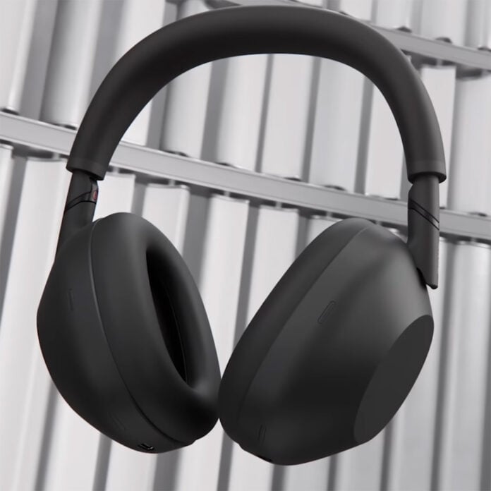 Sony WH-1000XM6 headphones, floating in the air with white blades behind them.