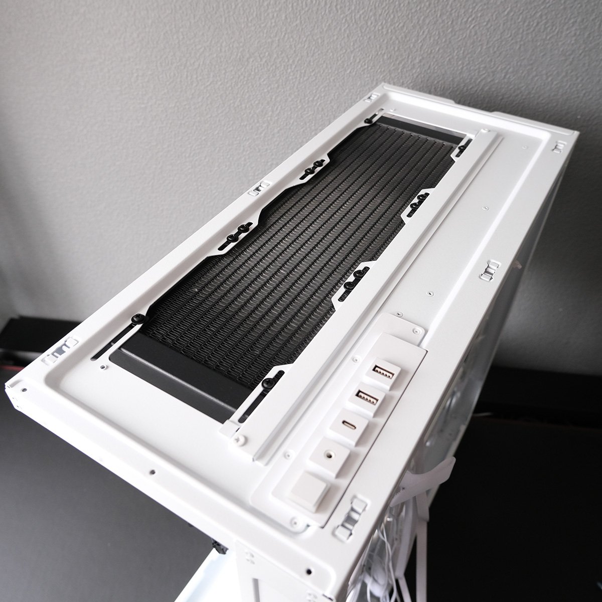 A shot of Arctic Xtender's exposed top panel, with AIO cooler installed.
