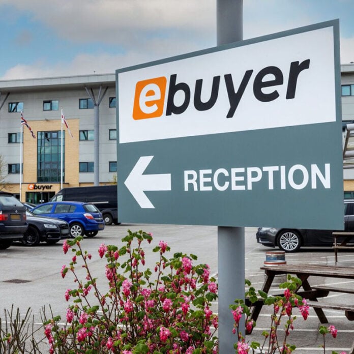 A picture of the car park outside of ebuyer, a sign points to the company's reception.