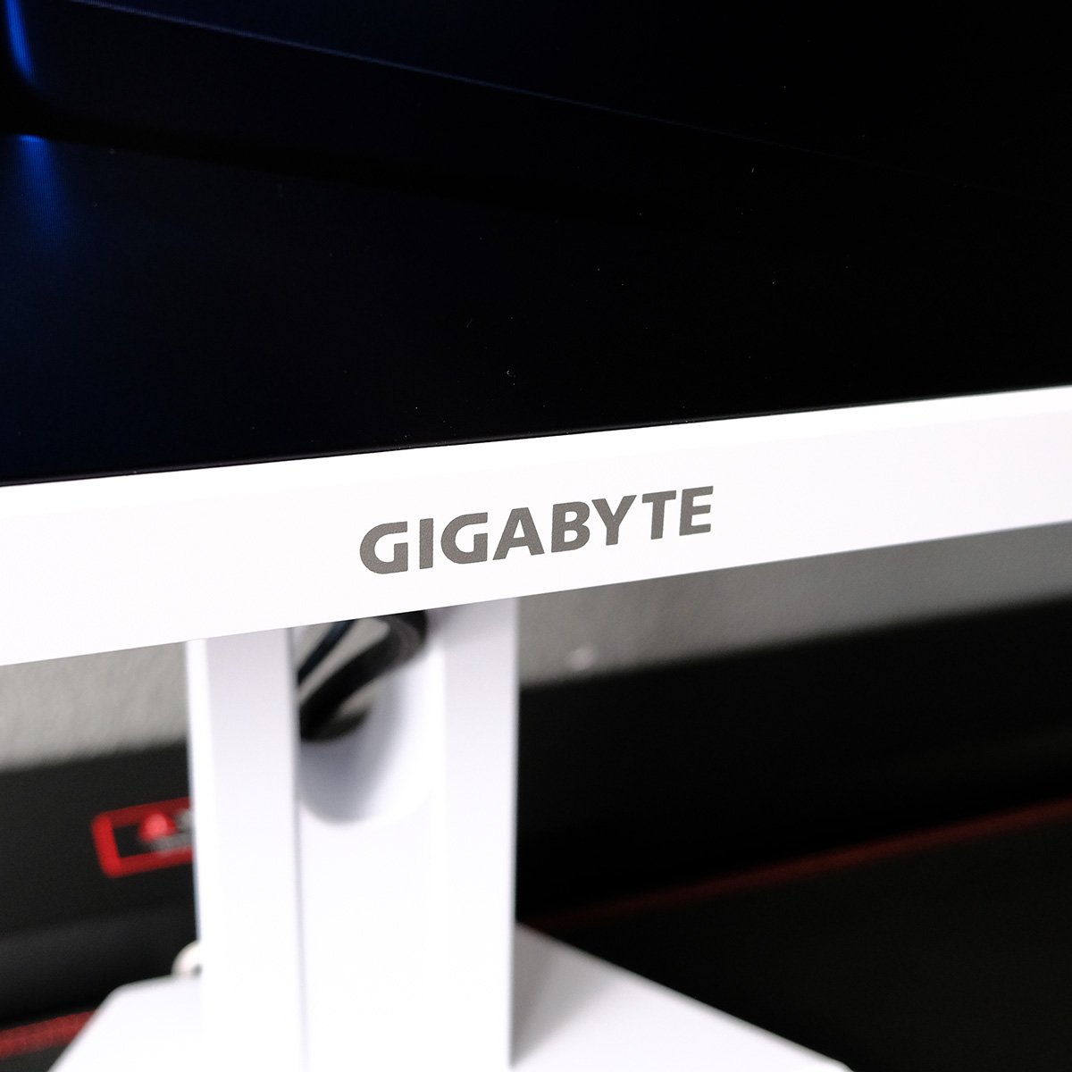 Close up of the central logo on Gigabyte M27QA Ice gaming monitor.
