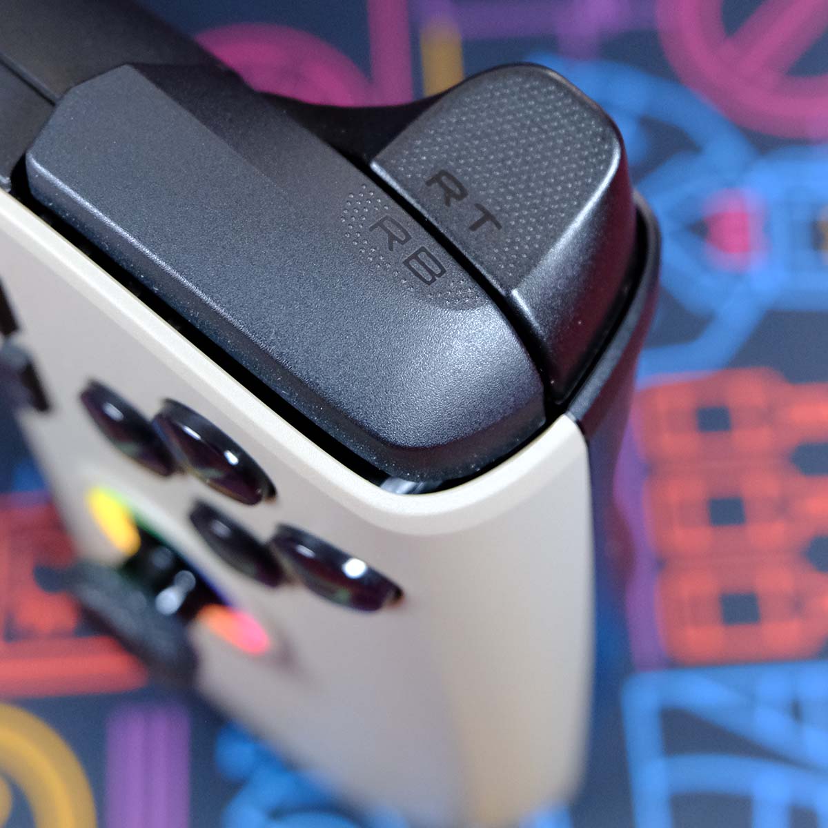 A close-up of MSI Claw 8 AI+'s bumpers and triggers.