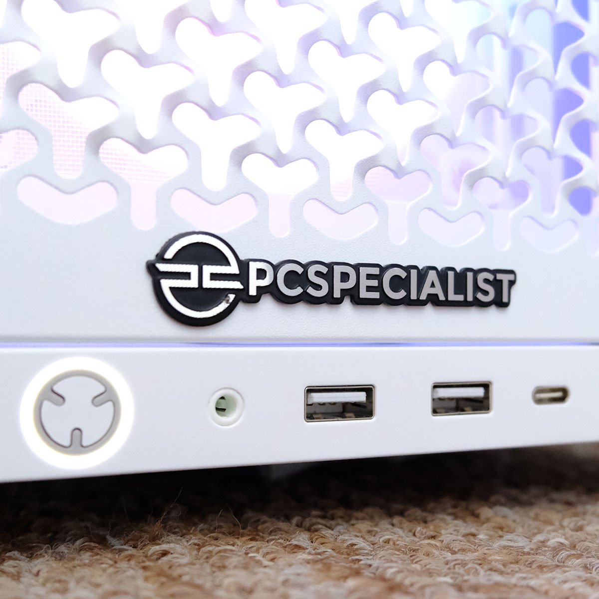 A close up of the PCSpecialist logo, on the front of Luna Recon Master's case.