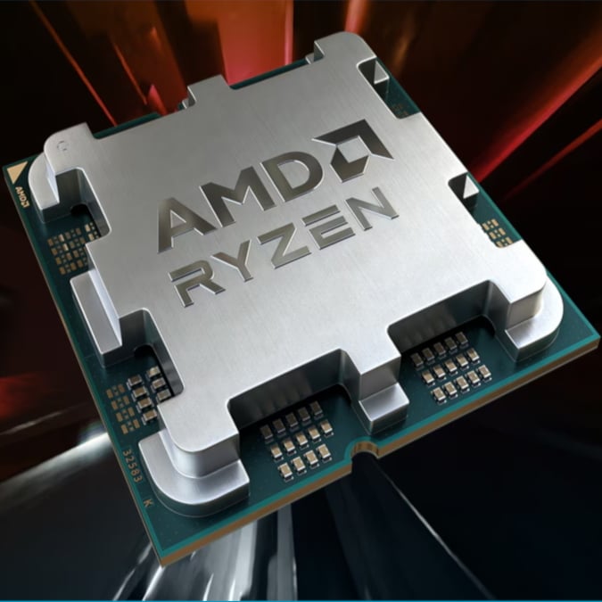 A 3D render of an AMD Ryzen processor, flying with streaks of orange and white behind it.
