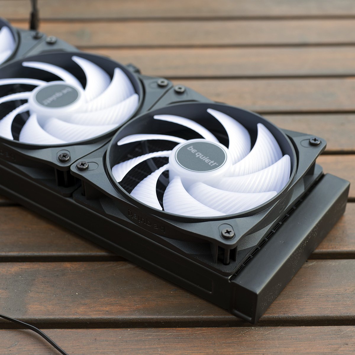 A close-up of fans attached to be quiet! Pure Loop 3 LX 360's radiator.