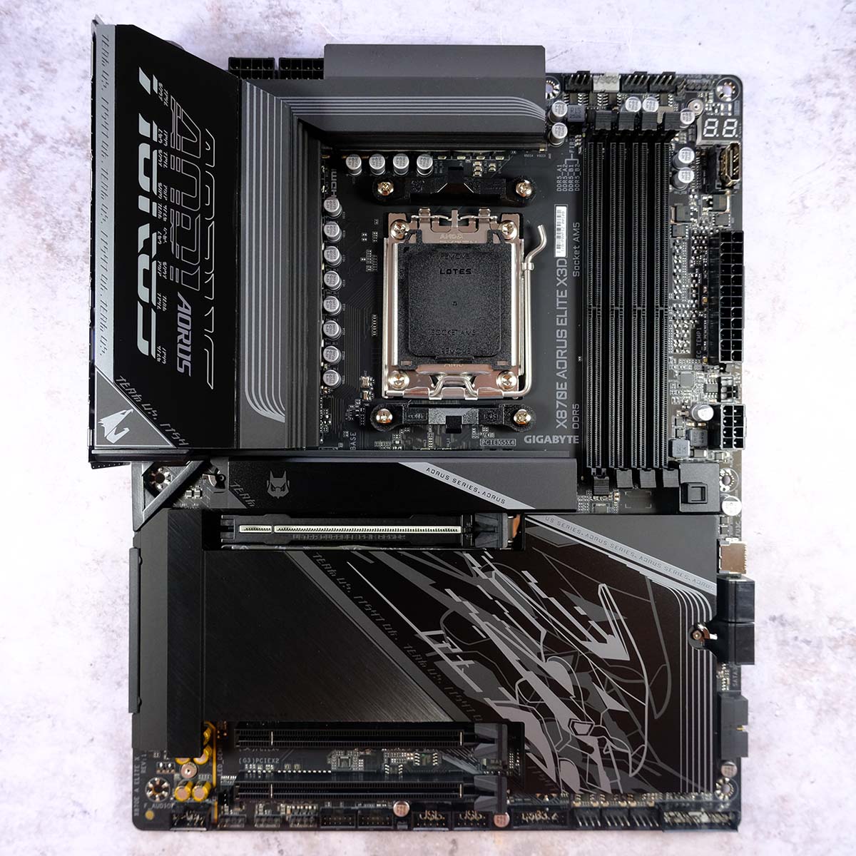 A top-down view of Gigabyte X870E Aorus Elite X3D, showcasing the motherboard in its entirety.