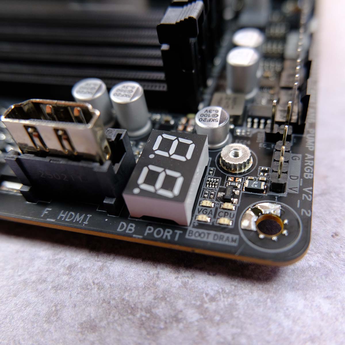 A close up of EZ Debug LEDs on Gigabyte X870E Aorus Elite X3D.