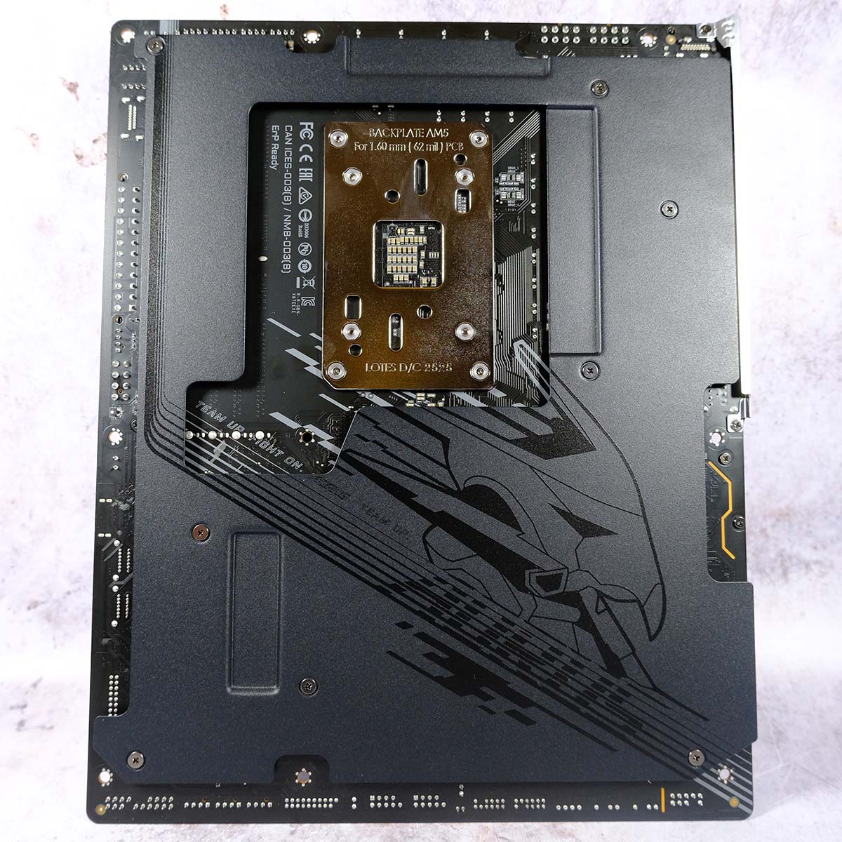 A top-down view of Gigabyte X870E Aorus Elite X3D's backplate.
