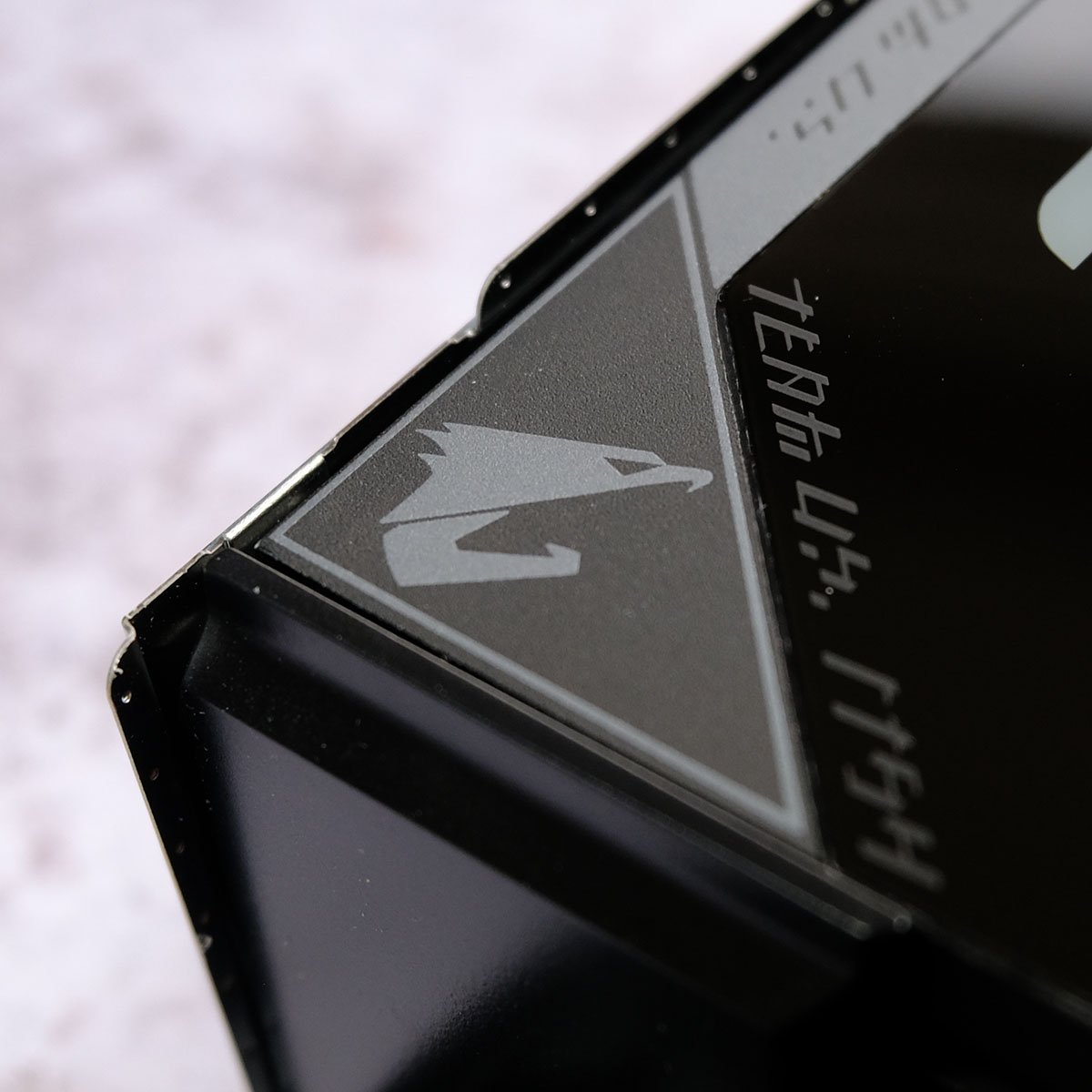 A close up of the Aorus logo on the VRM heatsink of Gigabyte X870E Aorus Elite X3D.