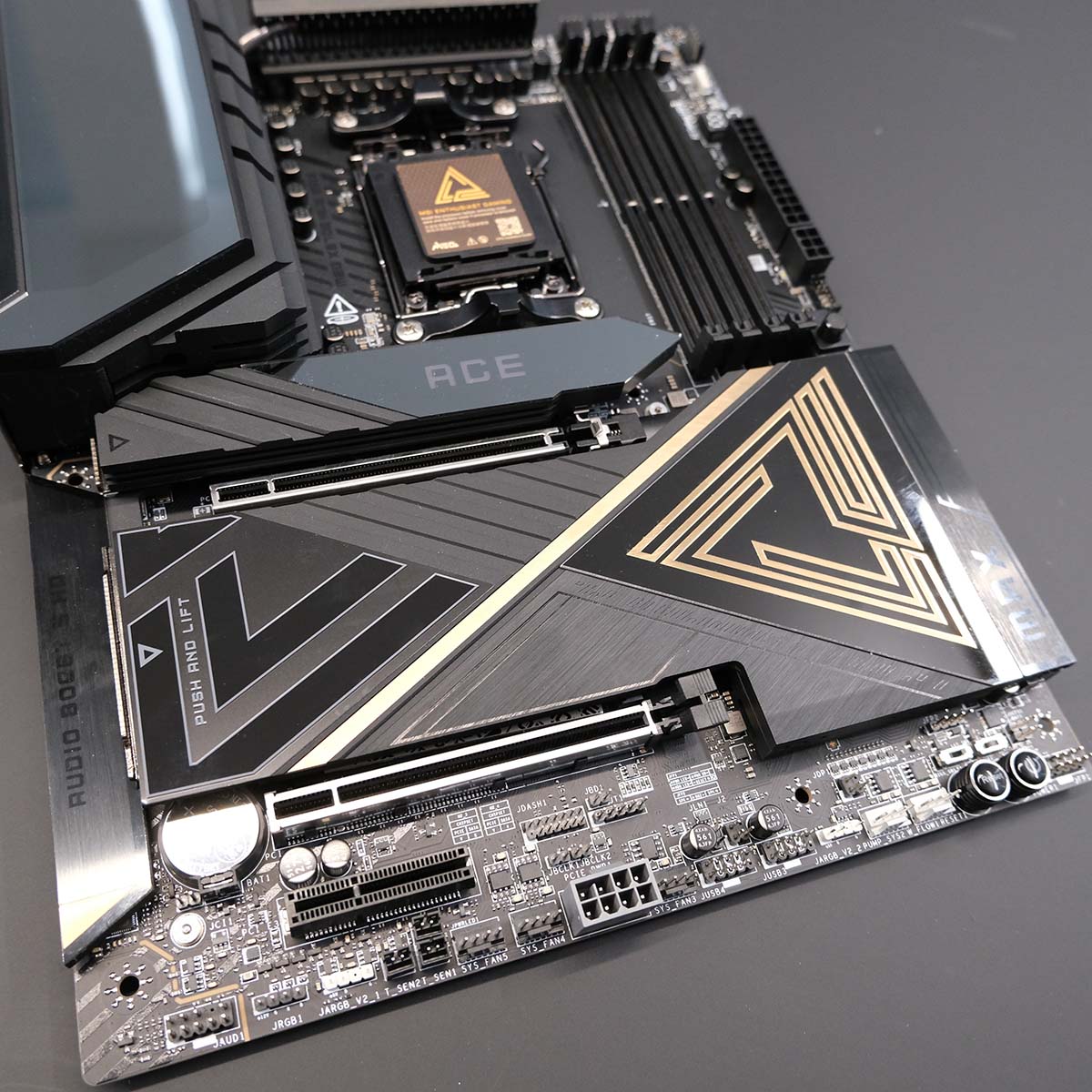 A close up of the toolless M.2 heatsink, covering MEG X870 Ace Max.