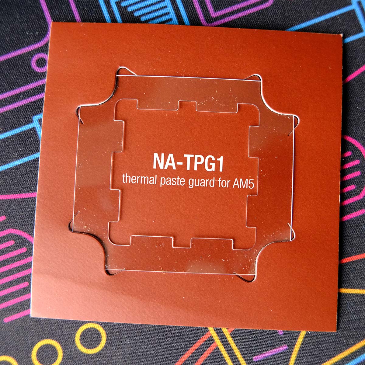 Close up of 'NA-TPG1' a.k.a. Noctua's Thermal Paste Guard for AM5.