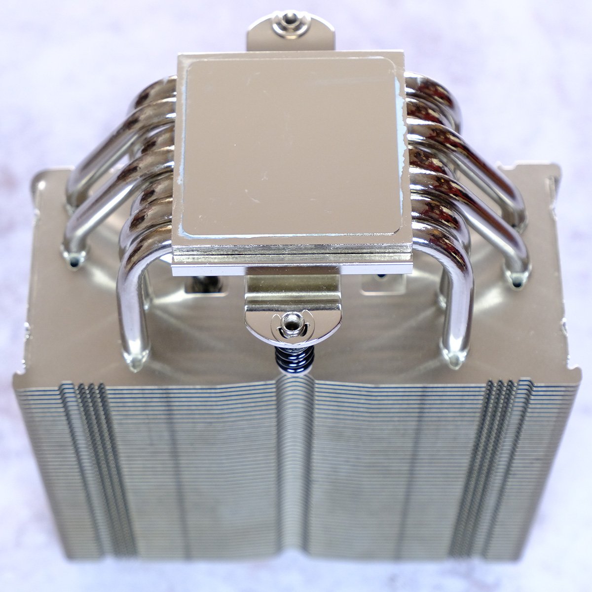 Close up of NH-U12A base, showcasing several heatpipes and a single large stack of aluminium fins.