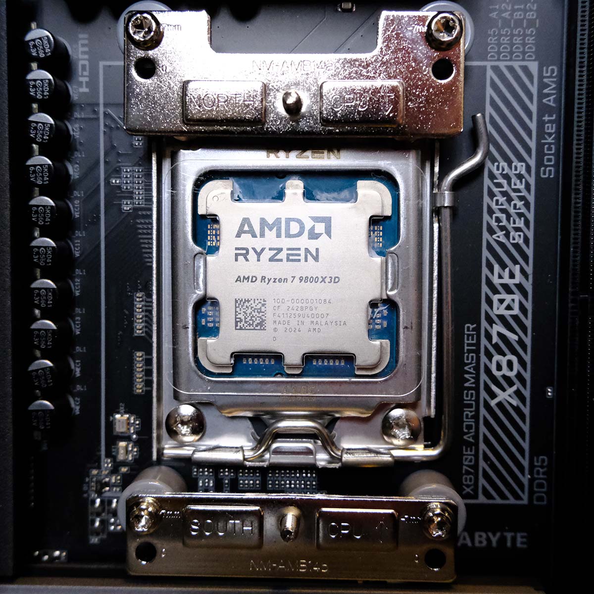 Ryzen 7 9800X3D, surrounded by SecuFirm2+™ mounting kit.