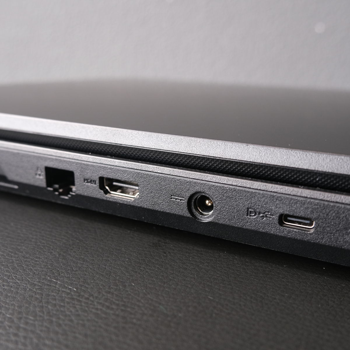 A close up of some ports on PCSpecialist Defiant 16, including Ethernet, HDMI, power, and USB-C.