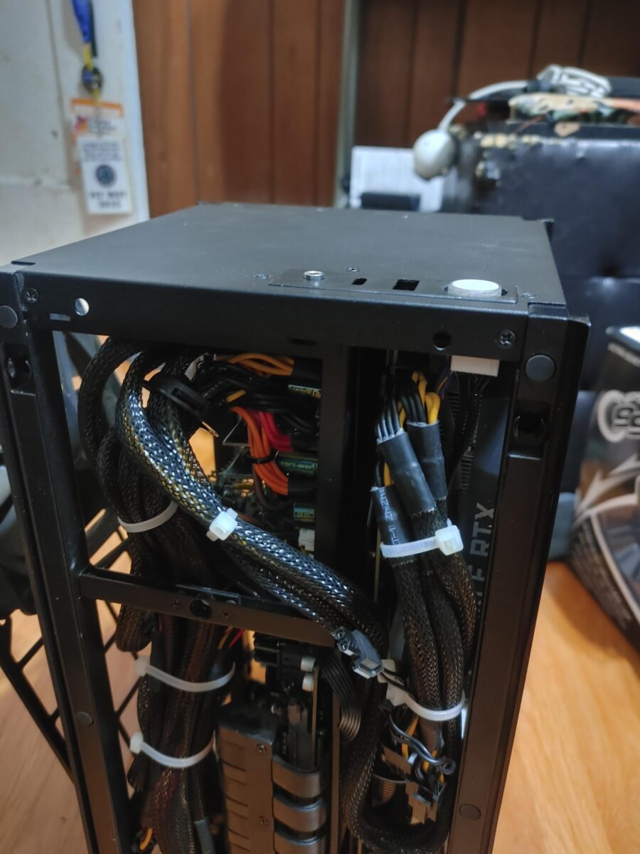 View of 'Frankenstein' PC build with zip ties holding everything in place