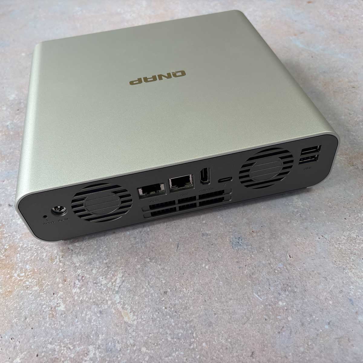 A picture of the QNAP E1.S SSD unit from the back.