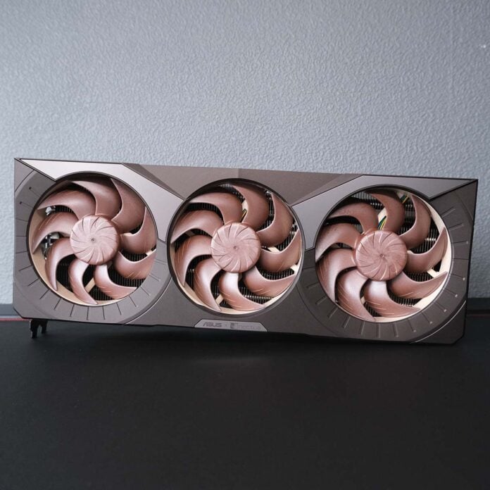 Asus GeForce RTX 5080 Noctua OC Edition - Upright Asus GeForce RTX 5080 Noctua OC Edition standing upright in a horizontal orientation.