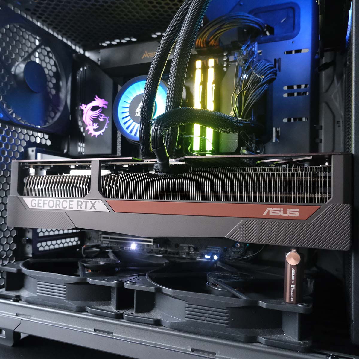 Asus GeForce RTX 5080 Noctua OC Edition sitting inside the Club386 test system.