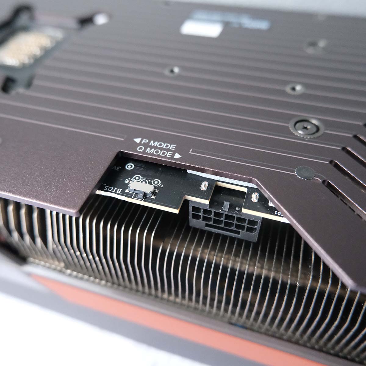 Close-up of dual BIOS switch on Asus GeForce RTX 5080 Noctua OC Edition backplate.