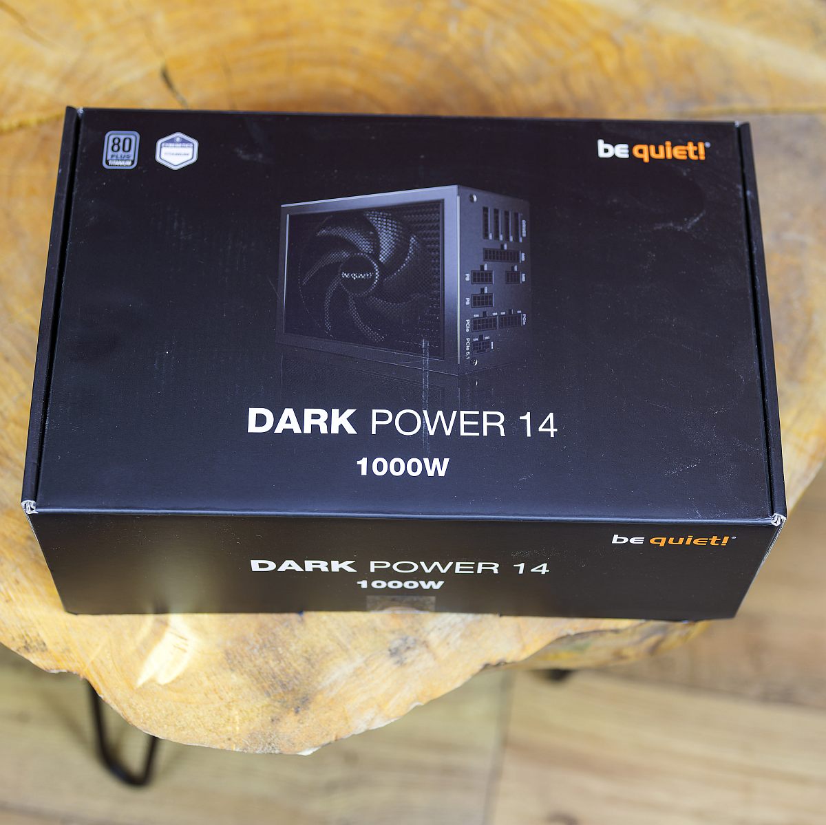 BQ Dark Power 14 1000W front of the box, black on a wooden table