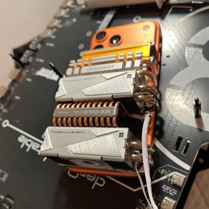 frankenstein iPhone 17 Pro Max with M.2 SSD coolers.