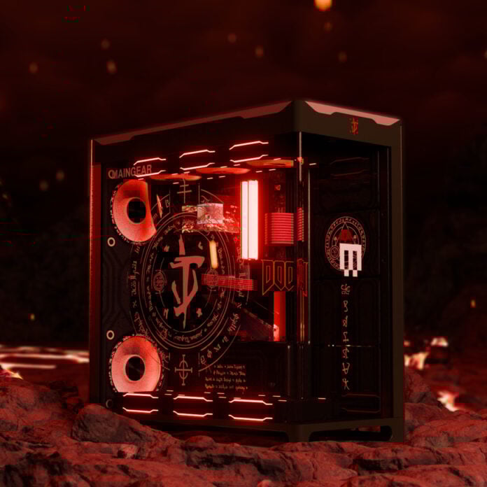 Maingear's limited edition Doom desktop gaming PC, bathed in red light, sat atop a rocky surface.