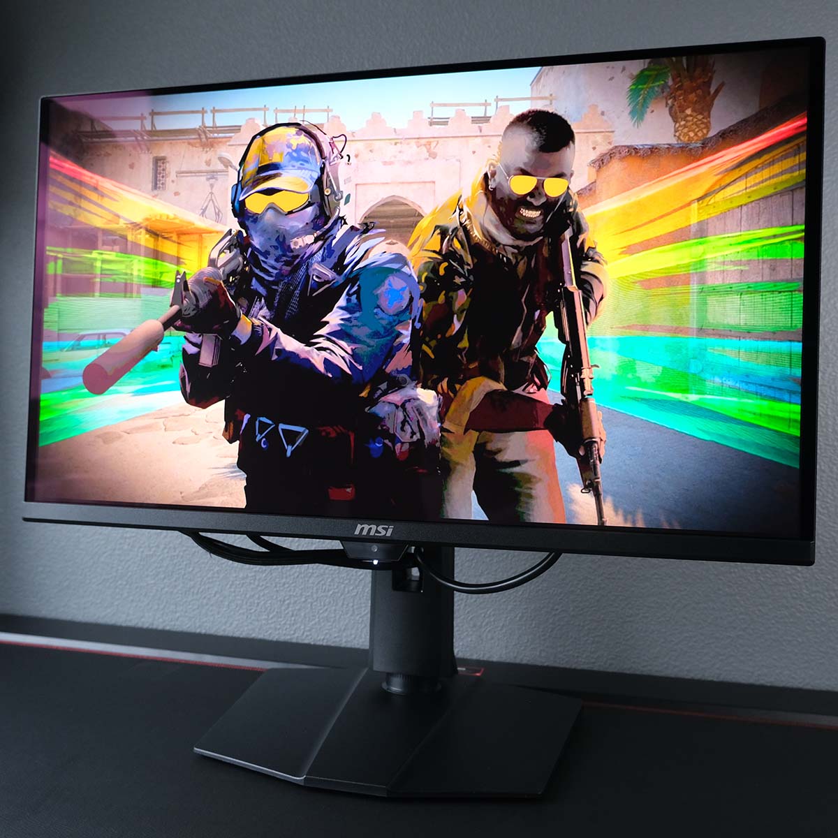Remixed key art from Counter-Strike 2, displayed on MSI MPG 271QR QD-OLED X50.