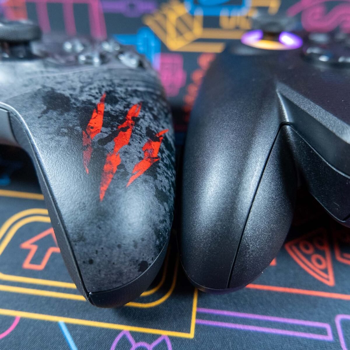 Xbox Series X controller (left) next to ROG Xbox Ally X (right).