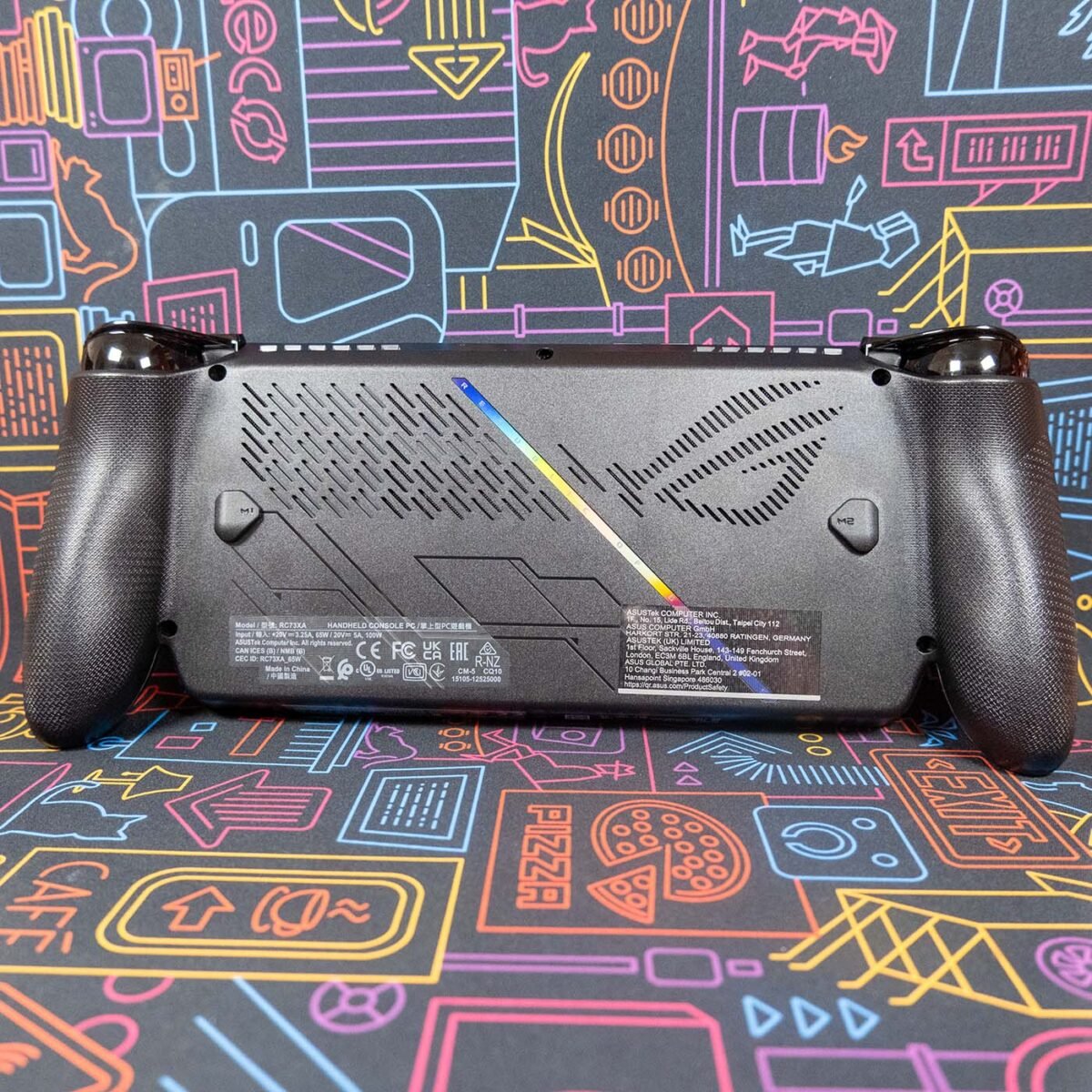 Rear of ROG Xbox Ally X against a neon-style backdrop.