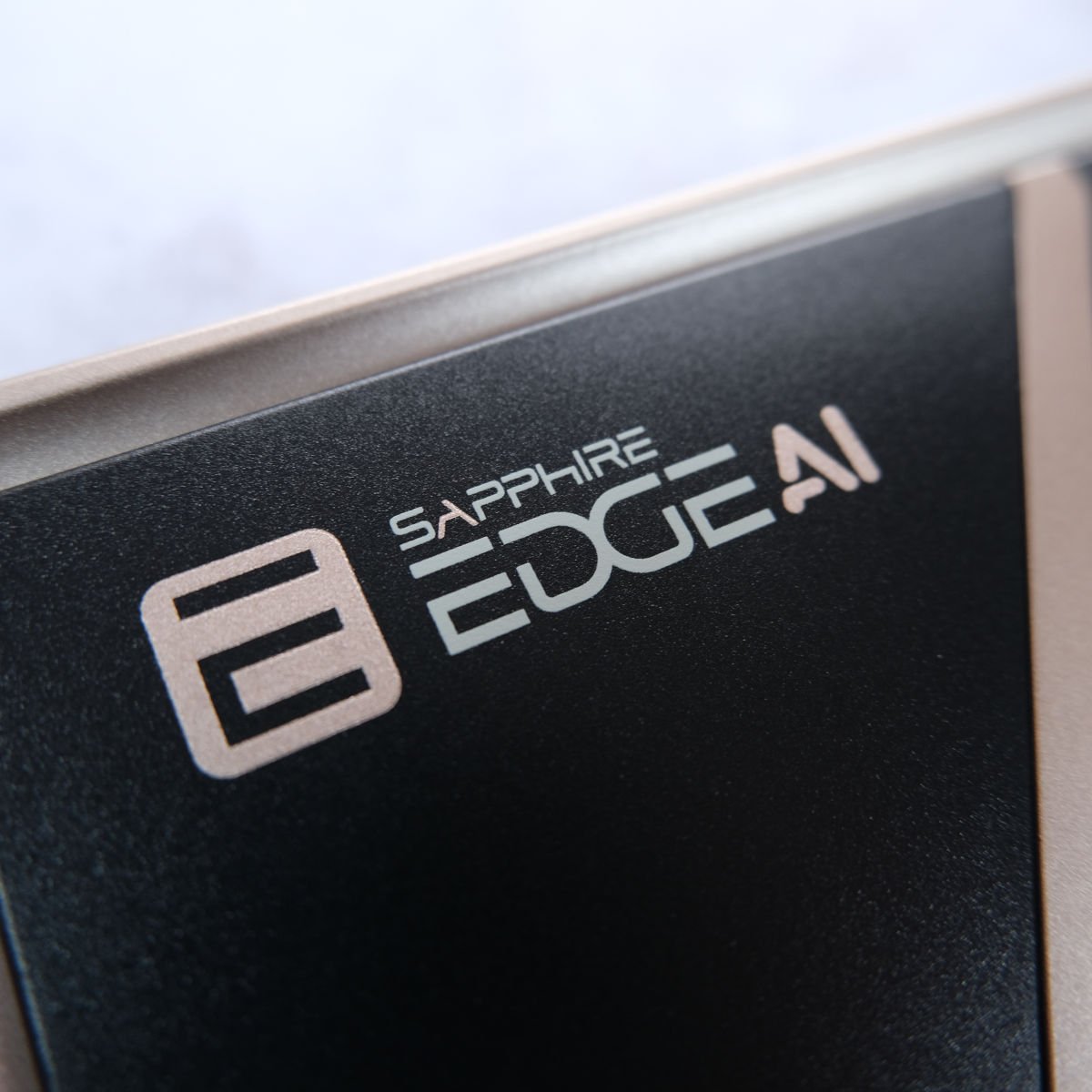 A close-up of the system logo atop Sapphire Edge AI 340.