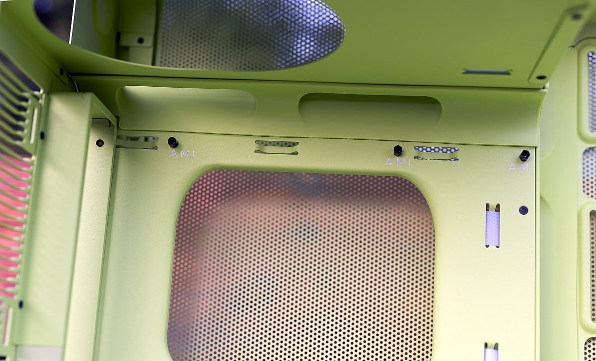 Hyte X50 interior, top, psu chamber, rubber grommets