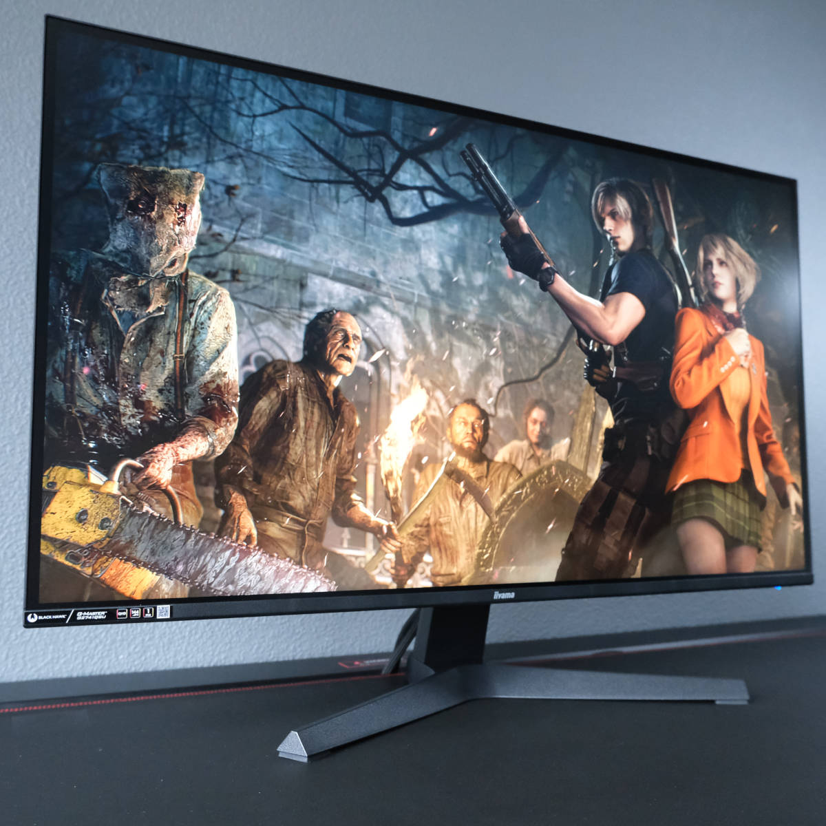 Resident Evil 4 (2023) key art displayed on G-Master G2741QSU-B1.