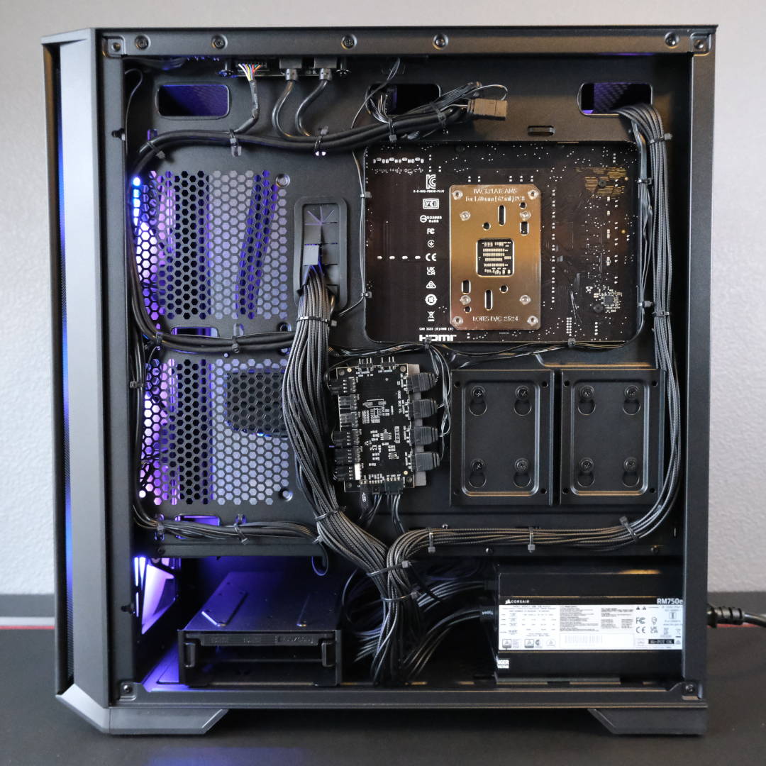 A wide shot of the PCSpecialist Vortex BF 25, showcasing the cable management present within the system.