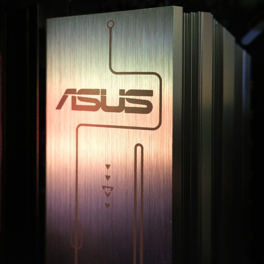 A close-up of the Asus logo atop the VRMs on the motherboard inside the PCSpecialist Vortex BF 25.