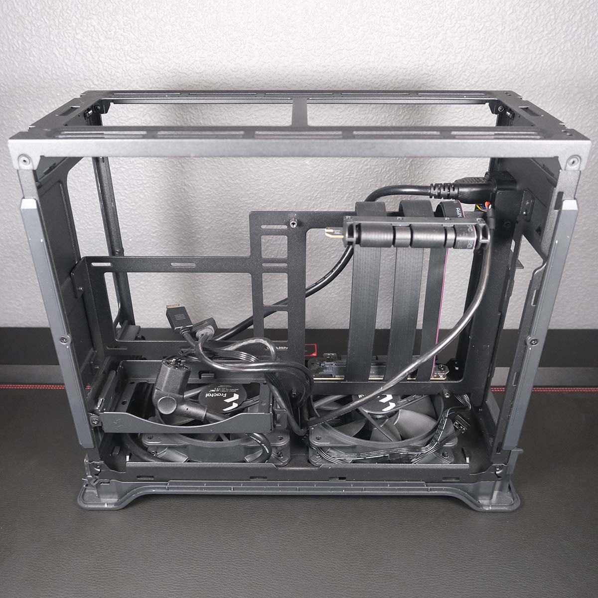 A top-down view of Fractal Design Era 2, panels removed, focusing on the CPU and PSU chamber.