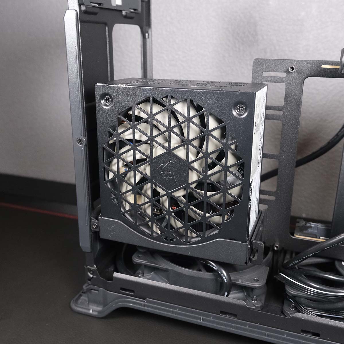 Corsair SF1000L placed inside the Fractal Design Era 2's PSU cradle.