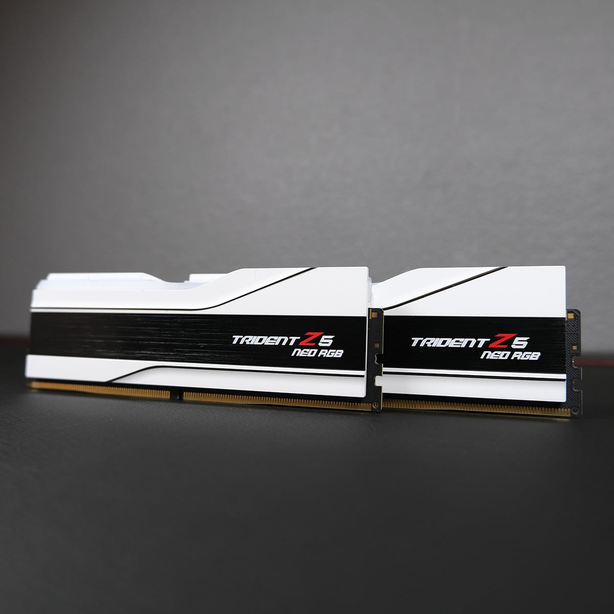 Two white G.Skill Trident Z5 Neo RGB DRAM modules, cascaded on top of each other.