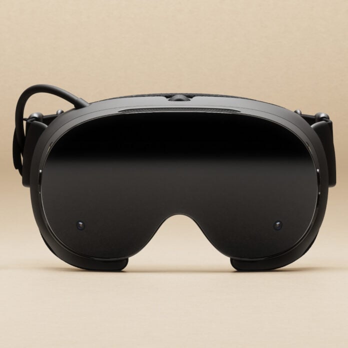 A Valve Steam Frame headset sitting against a beige background.