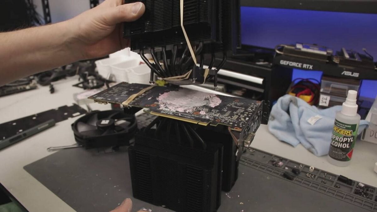 Modded RTX 2060 card with dual CPU tower coolers - paste application.