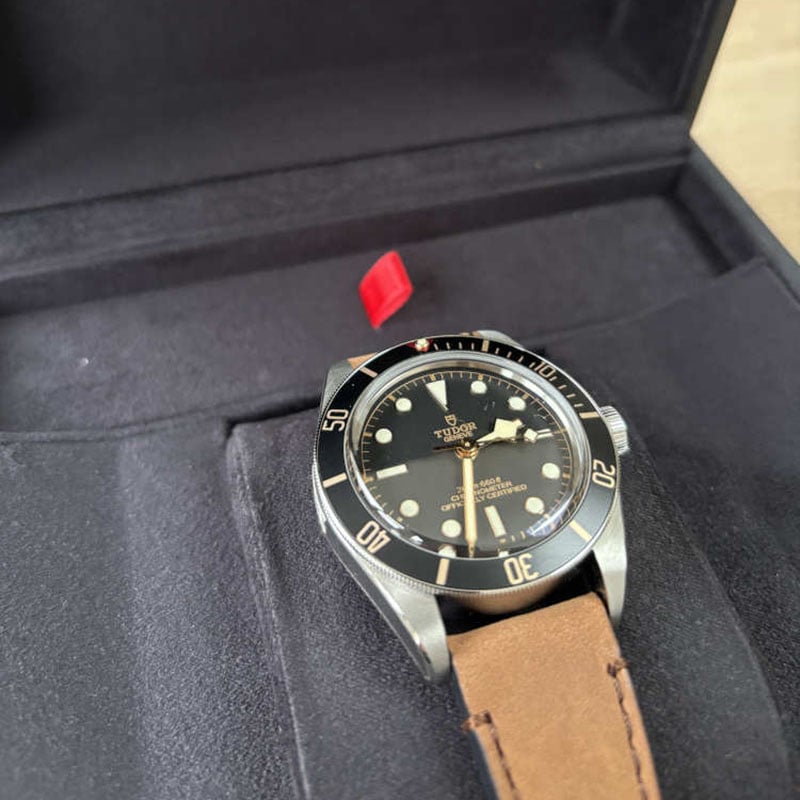 A picture of a Tudor Black Bay 58 with the leather strap.